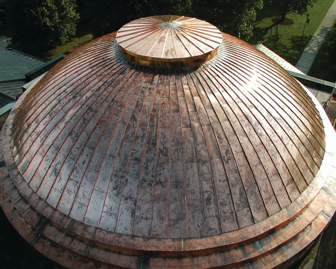 Craftsman Roofing crew installing a new roof in Holtsville